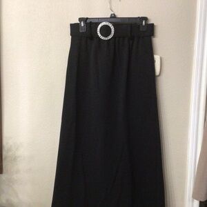Vintage black maxi skirt with elastic waist. . Belt says  size 12.